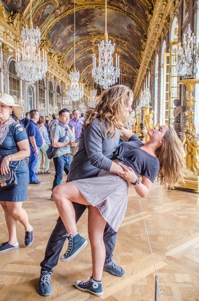 Students strike a pose in the Hall of Mirrors in the Palace of Versaille