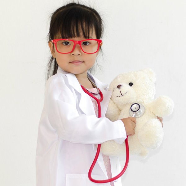 Girl doc with teddy bear