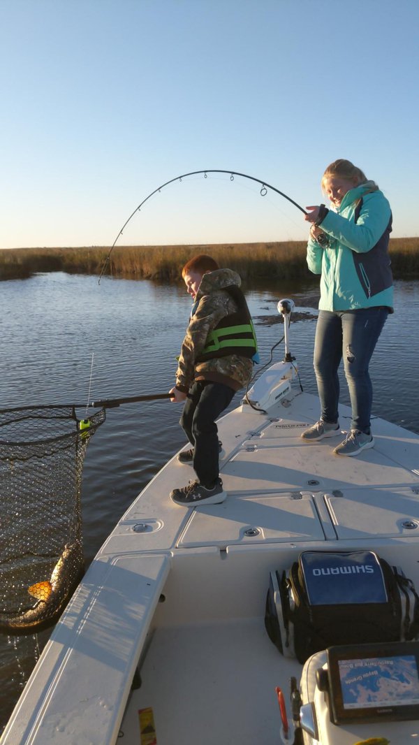 Kids Can Fish Reelin in the catch
