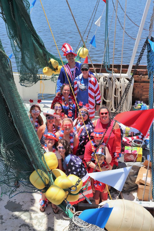 The patriotic revelers aboard the Amber Dawn