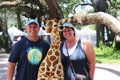 Bill and Tamara Langham with George the Giraffe