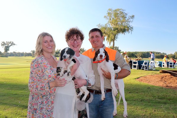 Mary Margaret Artman, Marie Artman, Wes Schlosser with aWesDog puppies