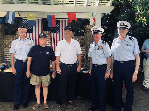 Coast Guard Auxiliary Lighthouse Crew celebrating the anniversary of the 25th year of service.