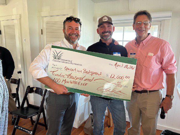Men Who Give Operation Bed Spread Check Presentation