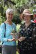 Dorris Burton, the first winner of the tabby house treasure hunt, accepting her award from Anne Aspinwall