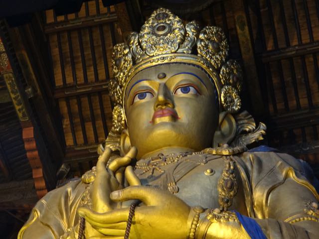 Gold leaf statue of Avalokitesvara, the embodiment of perfect compassion.