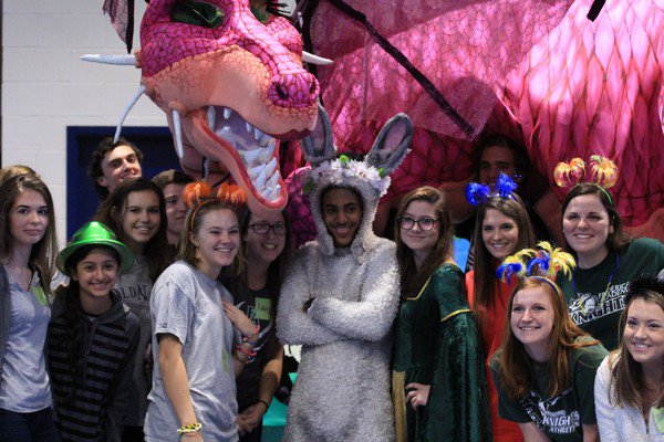 Shrek cast members with Frederica Academy students and dragon