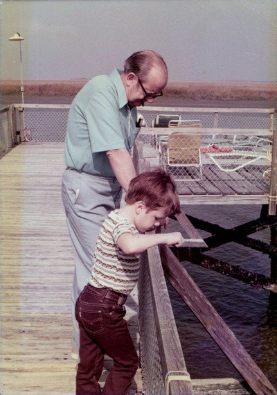 Trey Brunson, age 5, crabbing with his grandfather at his home in 1976.