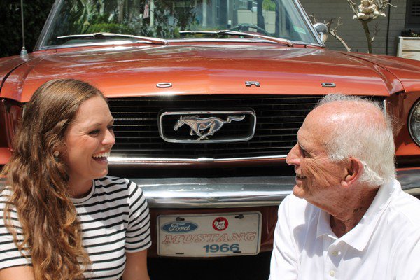 Anna Martin and her grandfather with his beloved Mustang.