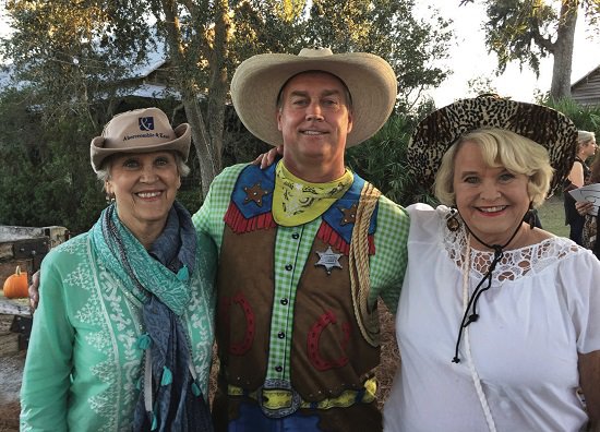 Nancy Butler, EIL Publisher David Butler, and Karen Manning at the 2016 Humane Society of South Coastal Georgia's Blue Jean Ball