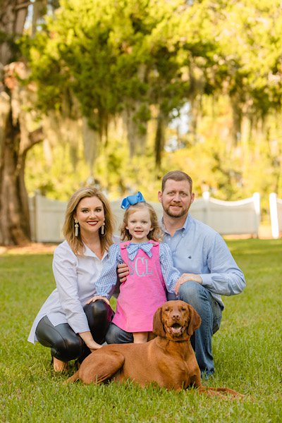 Jessica, Lanier and Michael Cannon with their dog Benjamin Franklin (Ben)