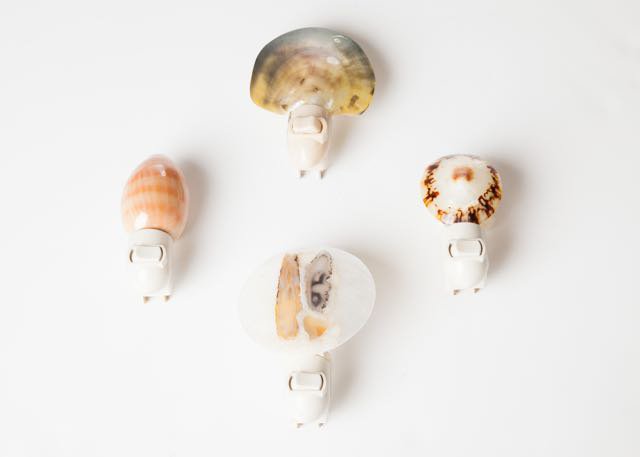 Let there be light…stylishly! These cute handcrafted seashell nightlights from Lamp and Shade Collection light your guests’ way along unlit halls or dark bathrooms and avoid the tackiness of a harsh, industrial nightlight.